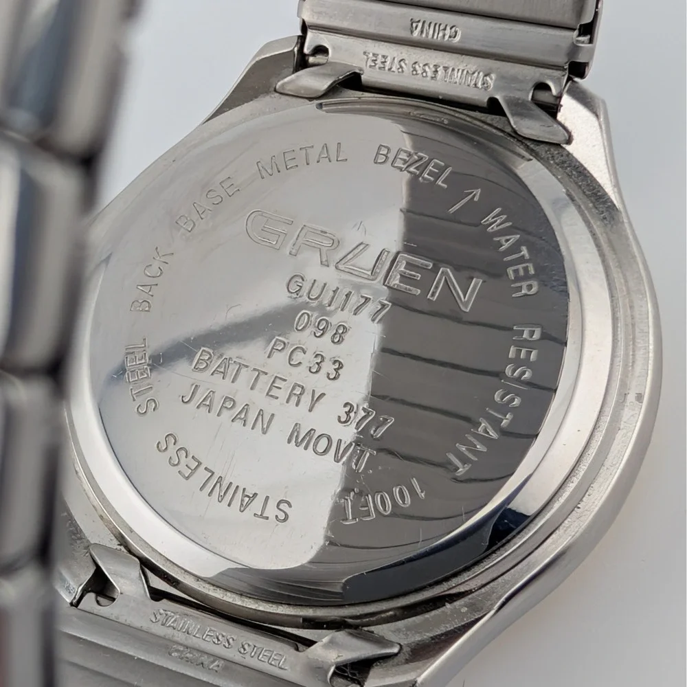 Gruen GU1177‎ Mens Quartz Day Date Watch Two Tone Gold Silver Textured Dial